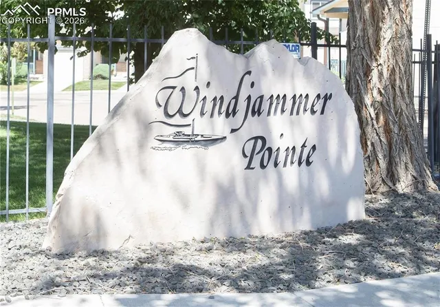 a front view of a house with a garage and a garage