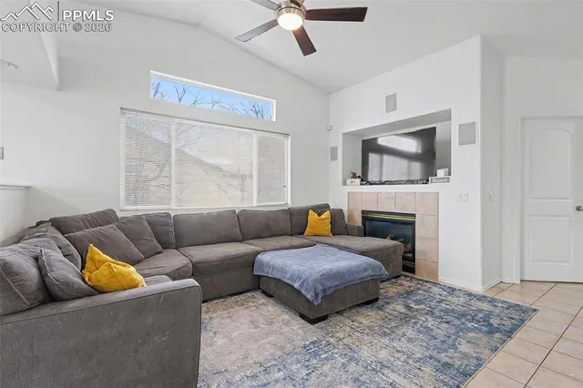 a kitchen with stainless steel appliances a stove a sink cabinets and a microwave