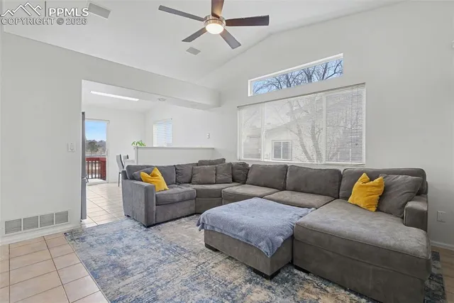 a kitchen with stainless steel appliances a stove microwave and refrigerator