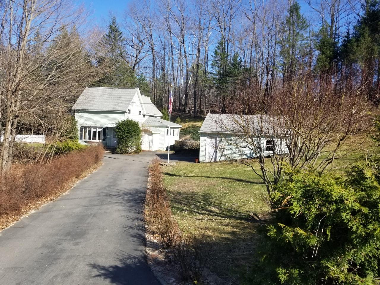 115 Botka Hill Road Livermore, ME 04253 - Photo 7 of 46 0346 closer up of the front home bay win