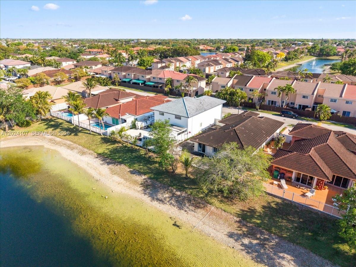 15341 Southwest 36th Street Miami, FL 33185 - Photo 52 of 56 an aerial view of residential houses with outdoor space