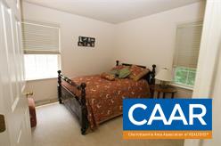 2480 Aspenwood Road Charlottesville, VA 22911 - Photo 10 of 15 a bedroom with a bed and window