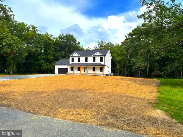 a front view of a house with swimming pool
