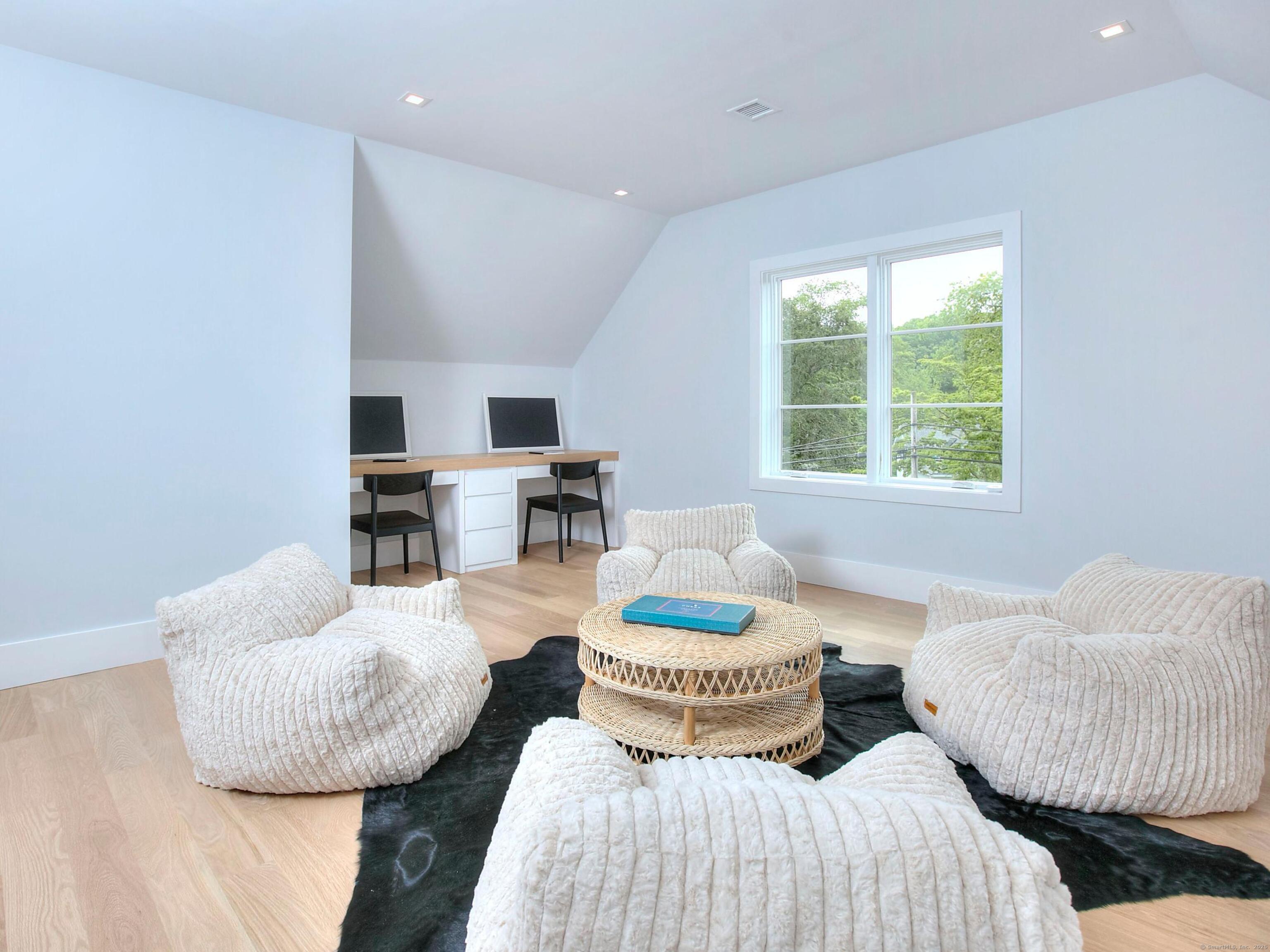 2 Webb Road Westport, CT 06880 - Photo 24 of 26 a living room with furniture and a window