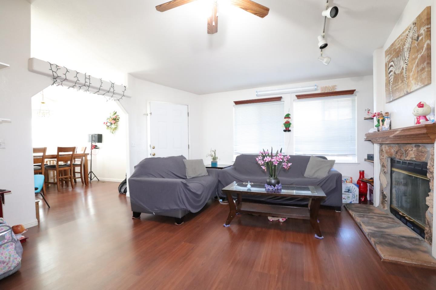 5450 Monterey Road, Unit 132 San Jose, CA 95111 - Photo 11 of 15 a living room with furniture and a fireplace