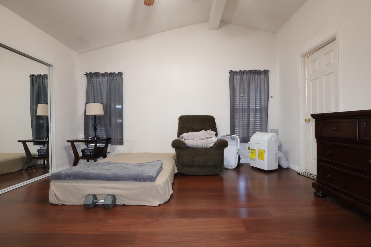 5450 Monterey Road, Unit 132 San Jose, CA 95111 - Photo 3 of 15 a living room with furniture and a lamp