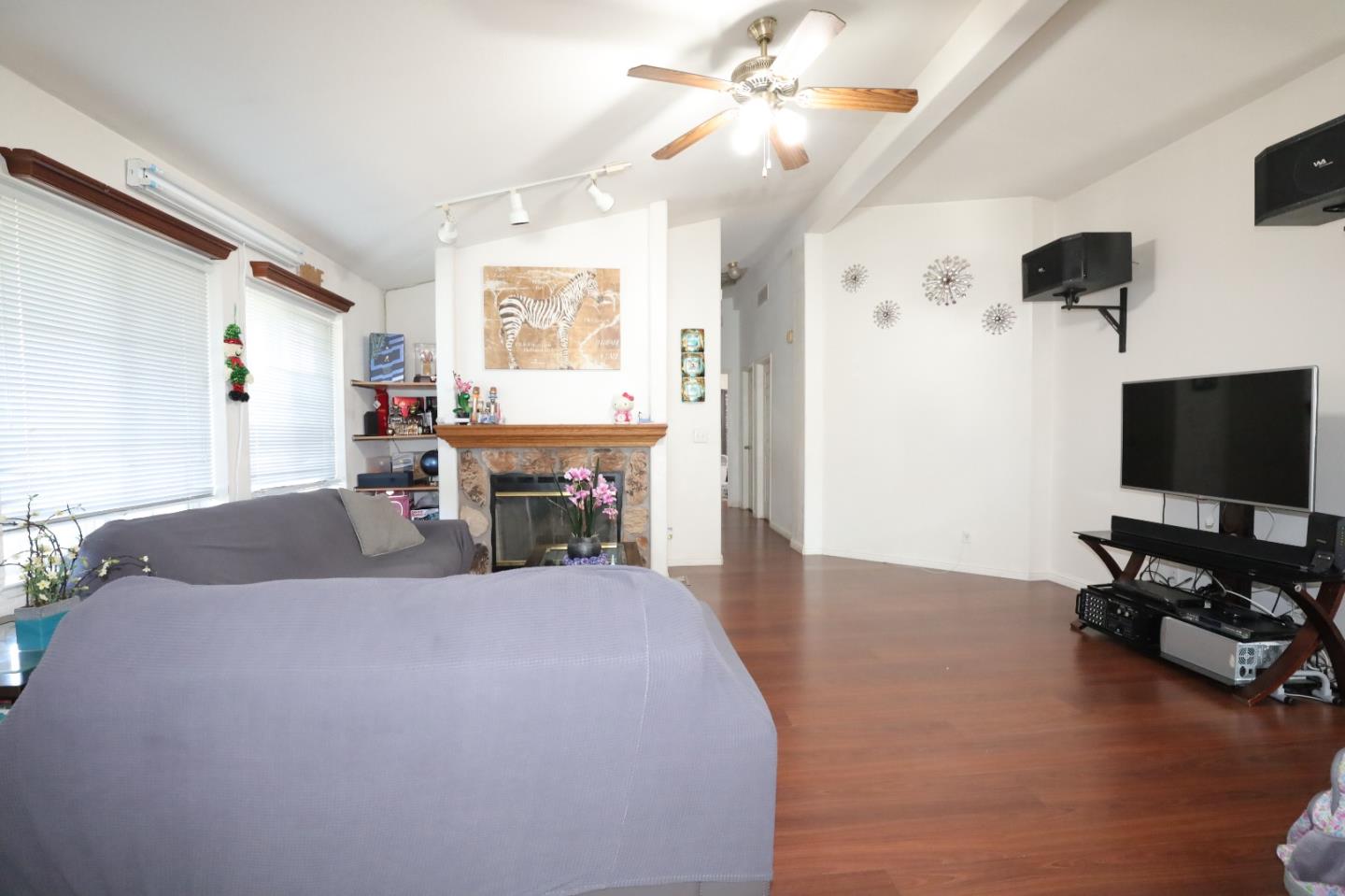 5450 Monterey Road, Unit 132 San Jose, CA 95111 - Photo 10 of 15 a living room with furniture and a flat screen tv