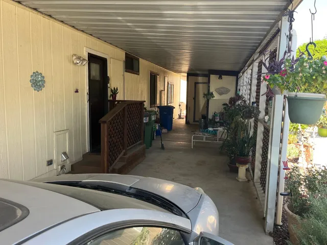 a view of a porch with furniture