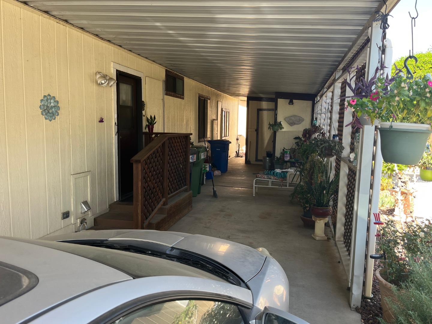 500 North Tully Road, Unit 39 Turlock, CA 95380 - Photo 28 of 32 a view of a porch with furniture