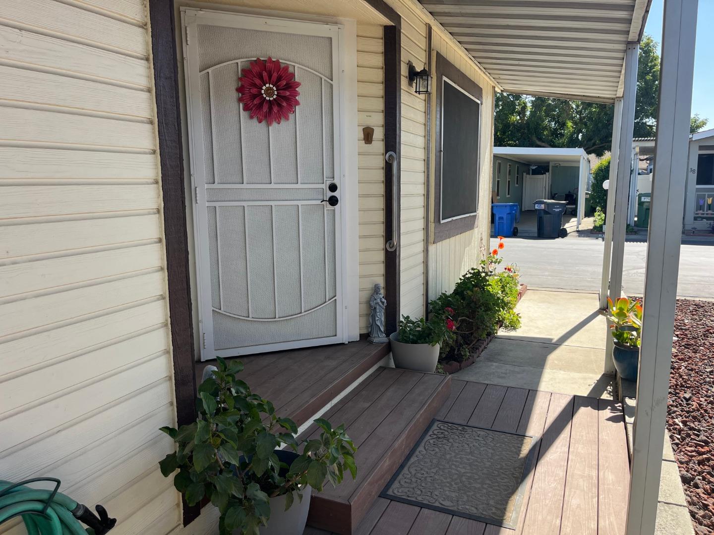 500 North Tully Road, Unit 39 Turlock, CA 95380 - Photo 4 of 32 a view of a entryway door front of house