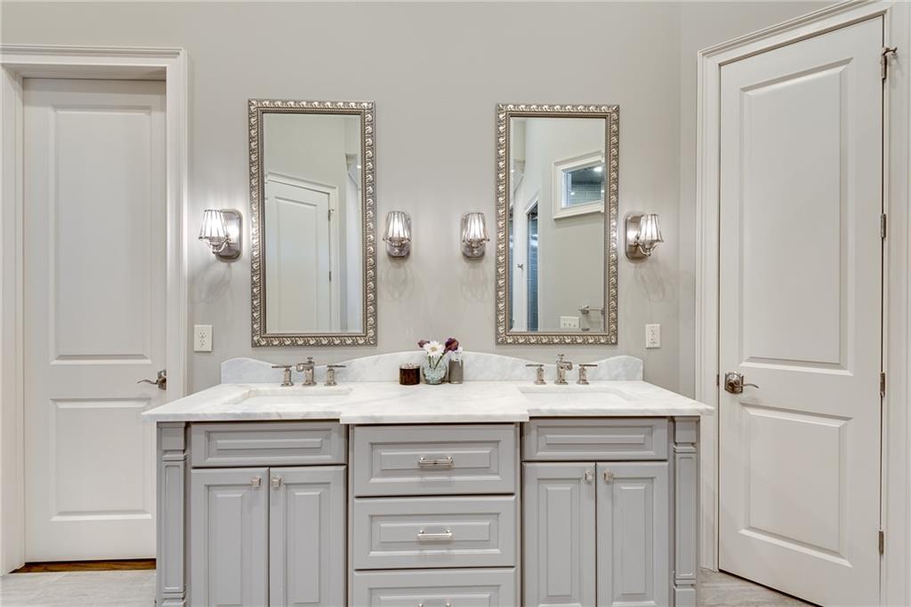 187 Fontaine Road Southwest Mableton, GA 30126 - Photo 36 of 84 a bathroom with double sink and a mirror
