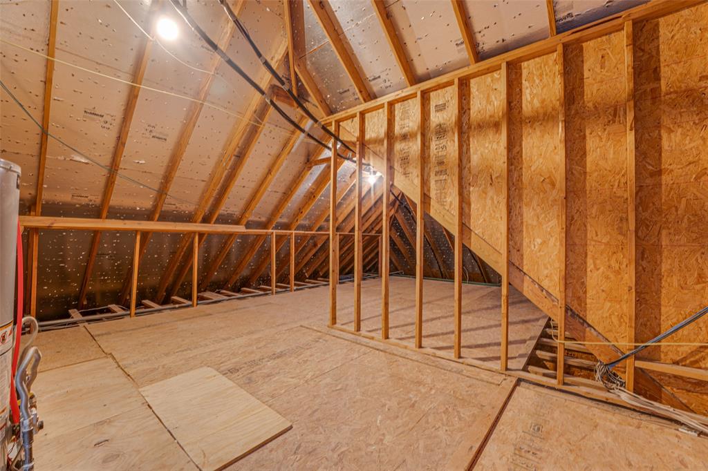 2216 Kings Pass Heath, TX 75032 - Photo 38 of 40 Fabulous walk-in attic storage