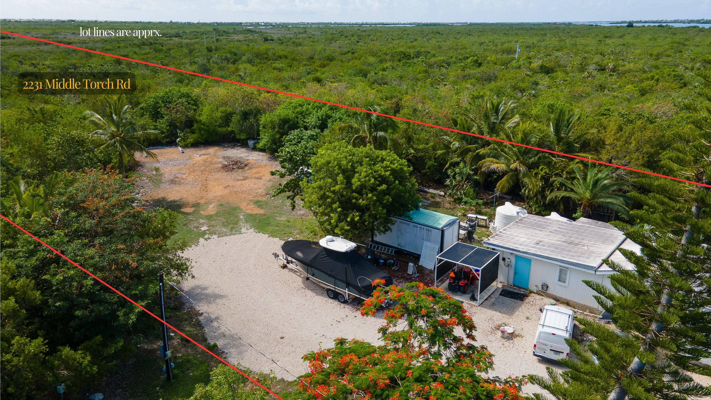 2231 Middle Torch Road Summerland Key, FL 33042 - Photo 18 of 36 an aerial view of a house with a yard