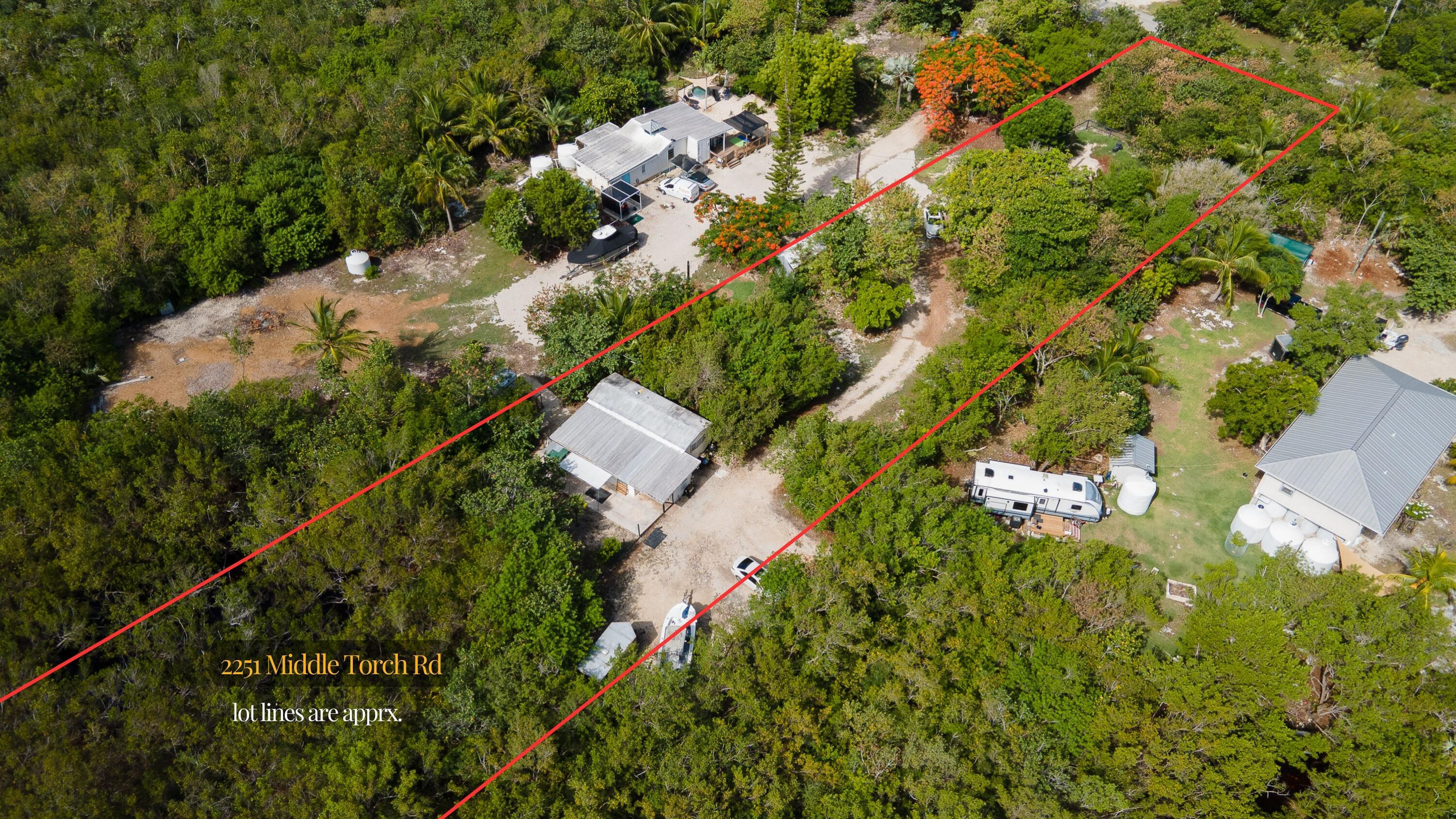 2231 Middle Torch Road Summerland Key, FL 33042 - Photo 21 of 36 an aerial view of residential house with outdoor space and trees all around