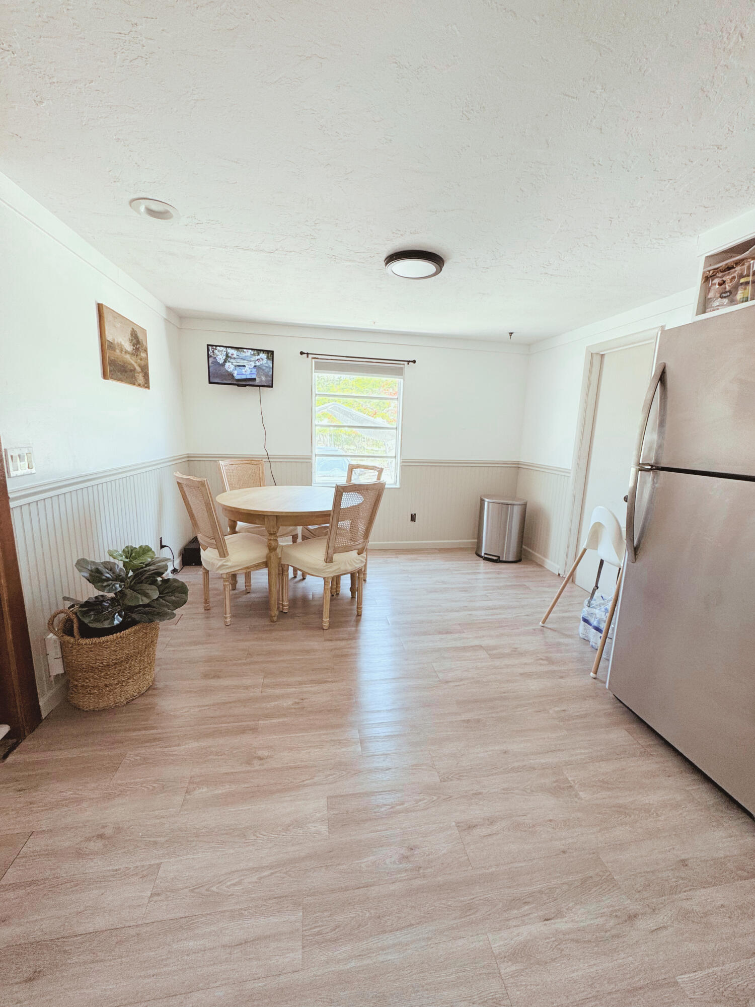 2231 Middle Torch Road Summerland Key, FL 33042 - Photo 24 of 35 a living room with furniture and a dining table with wooden floor