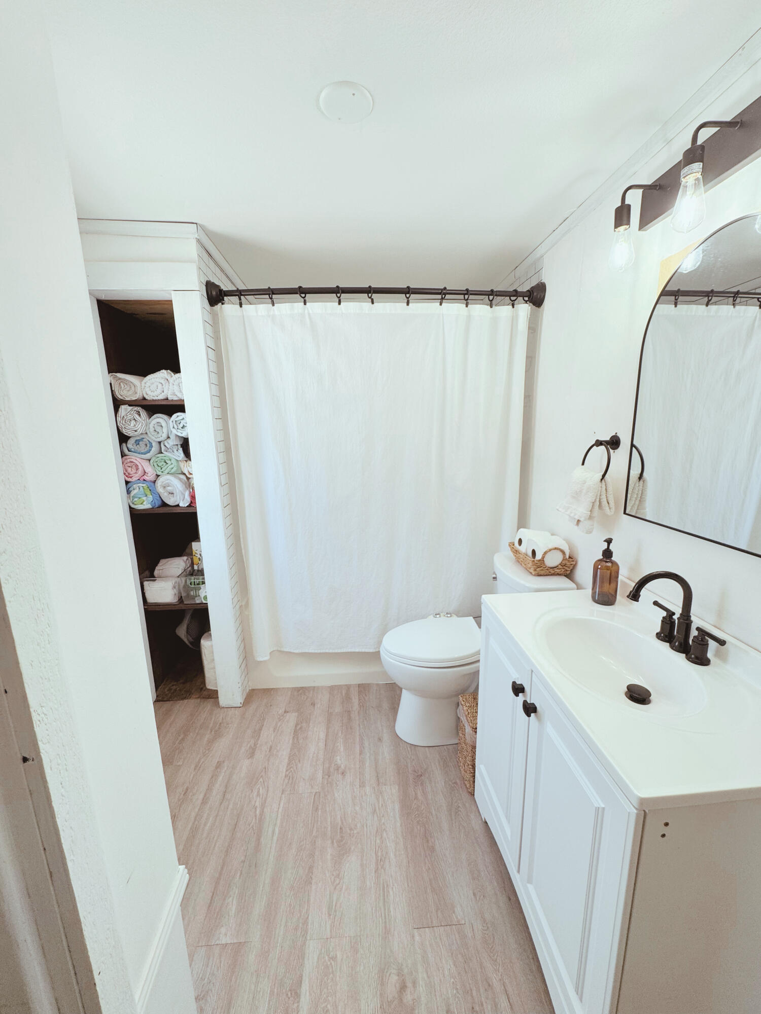 2231 Middle Torch Road Summerland Key, FL 33042 - Photo 31 of 36 a bathroom with a sink and mirror with toilet