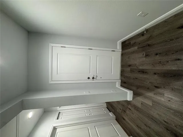 a view of an empty walk in closet