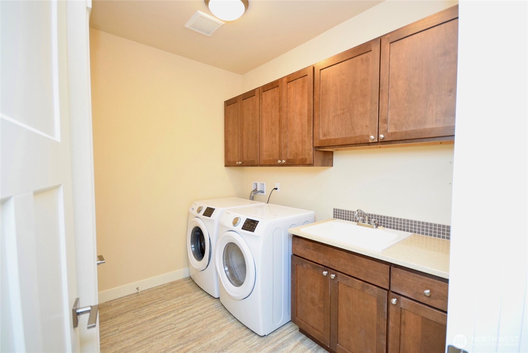 261 Mt Baker Drive, Unit B Sequim, WA 98382 - Photo 15 of 28 a utility room with dryer and washer