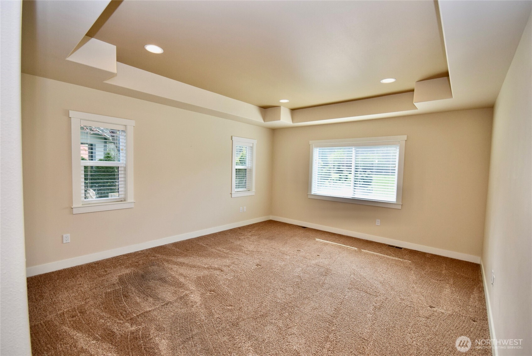 261 Mt Baker Drive, Unit B Sequim, WA 98382 - Photo 16 of 28 an empty room with windows
