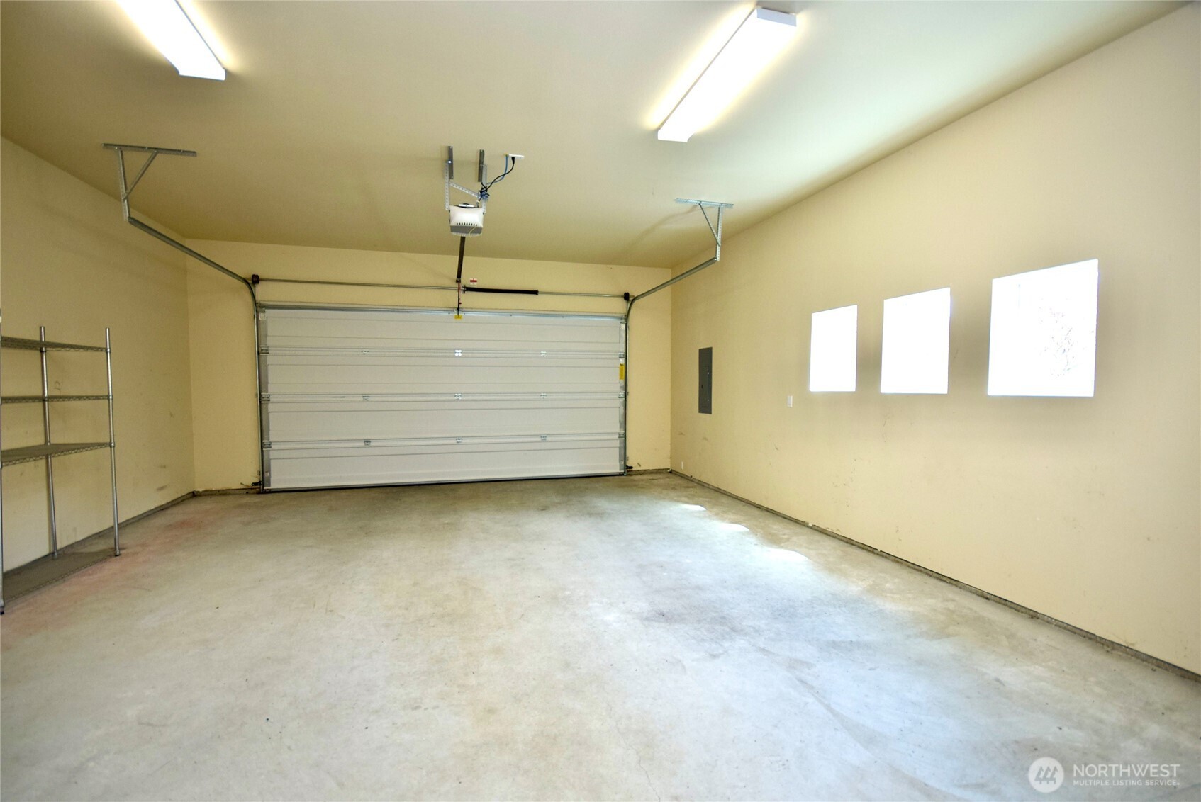 261 Mt Baker Drive, Unit B Sequim, WA 98382 - Photo 24 of 28 a view of a garage