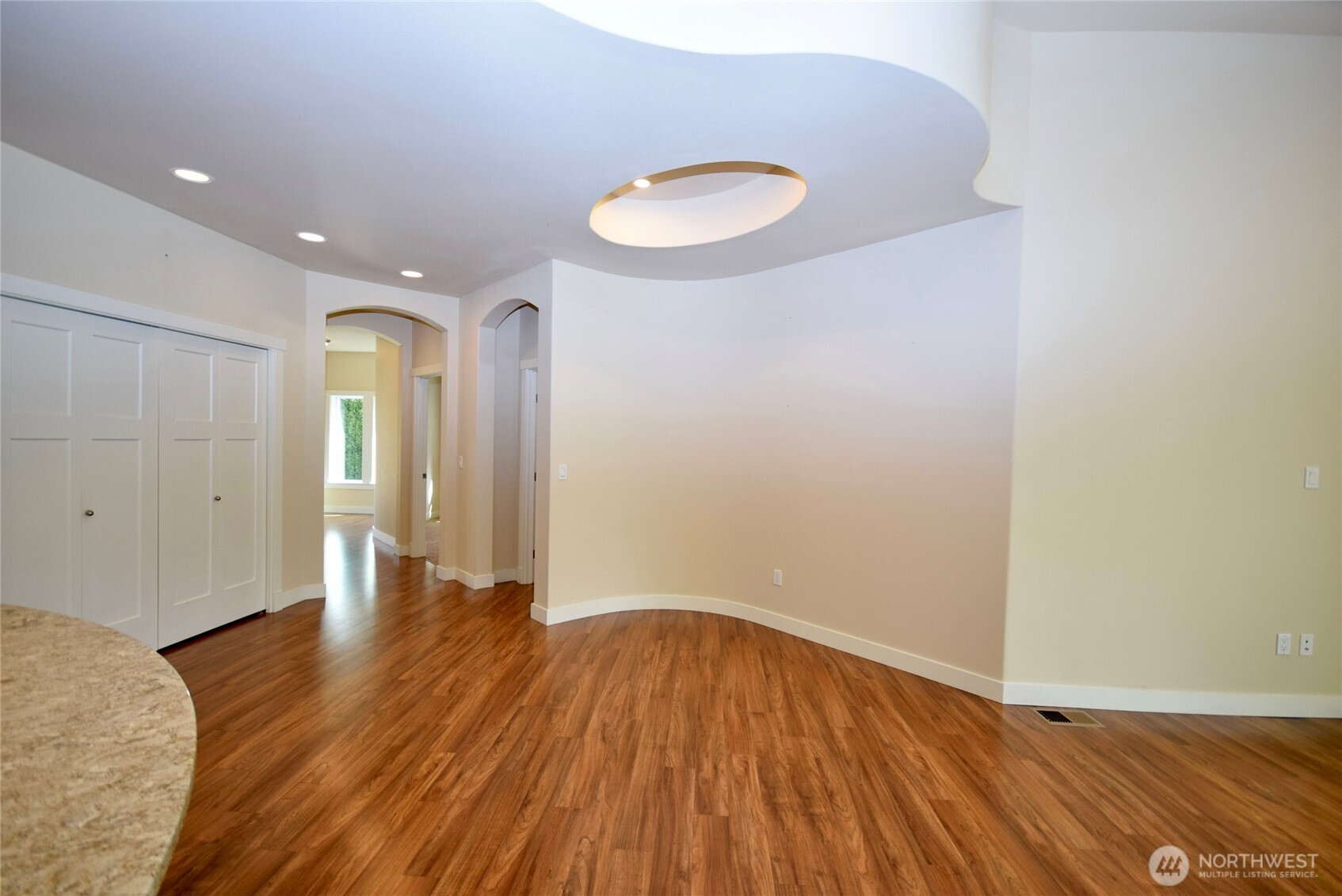 261 Mt Baker Drive, Unit B Sequim, WA 98382 - Photo 7 of 28 a view of a room with wooden floor