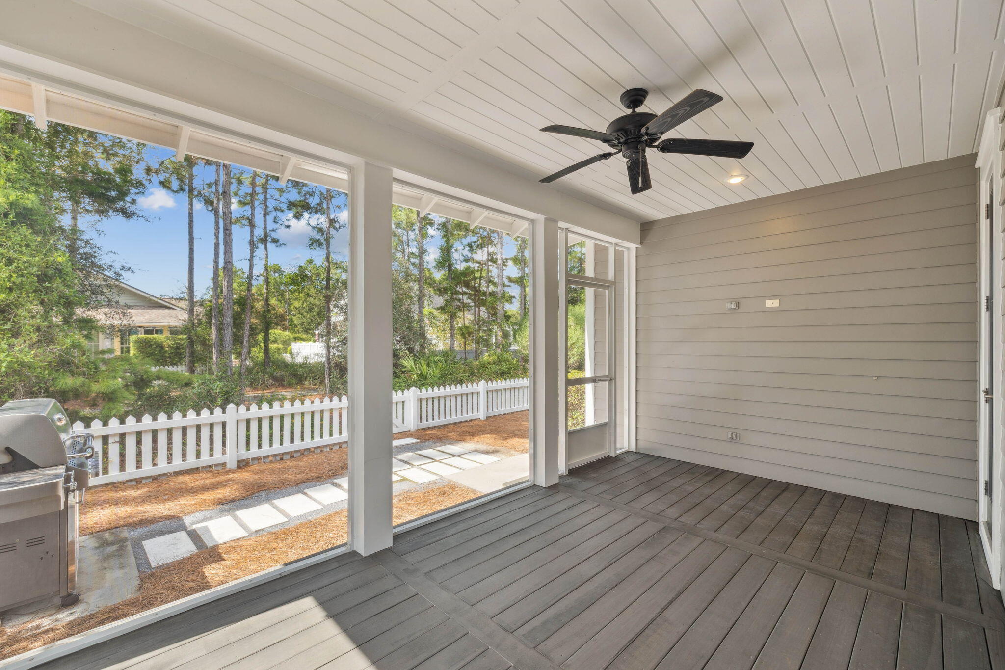 167 Jack Knife Drive Inlet Beach, FL 32461 - Photo 27 of 40 a view of empty room with wooden floor and fan