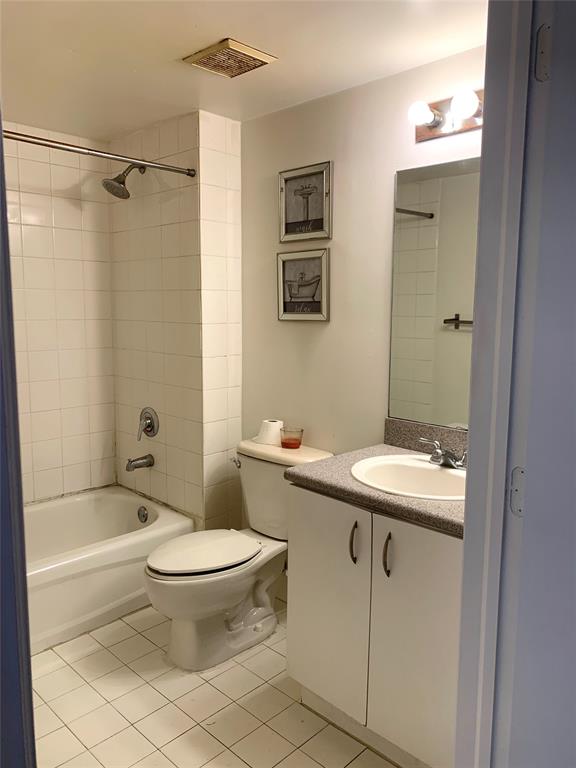 816 Northwest 11th Street, Unit 710 Miami, FL 33136 - Photo 5 of 10 a bathroom with a sink toilet and shower