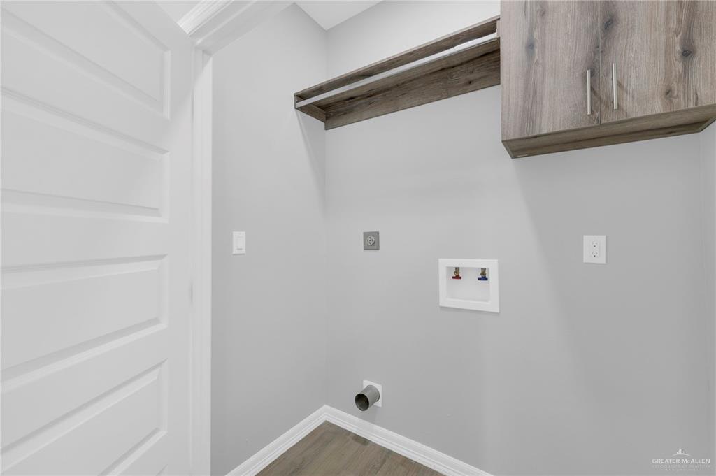 600 Bridget Street Weslaco, TX 78596 - Photo 17 of 23 a bathroom with a shower and a window