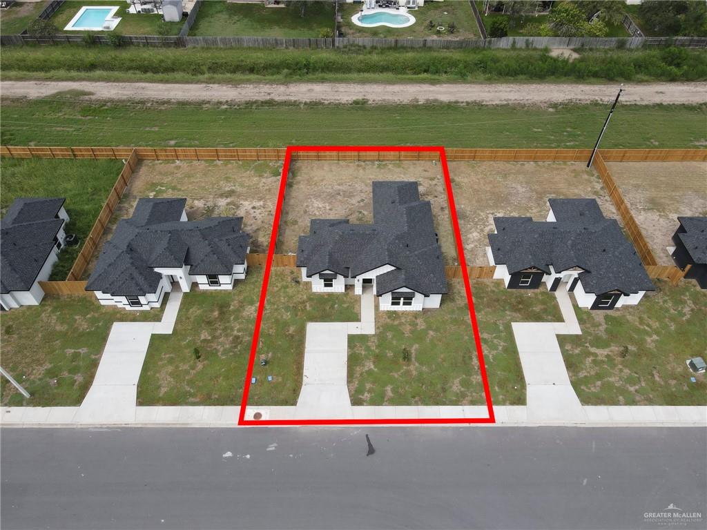 600 Bridget Street Weslaco, TX 78596 - Photo 21 of 23 an aerial view of a house with a yard