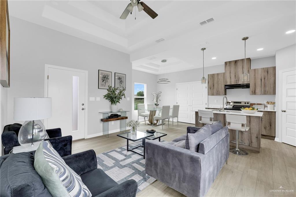 600 Bridget Street Weslaco, TX 78596 - Photo 9 of 23 a living room with furniture kitchen view and a window