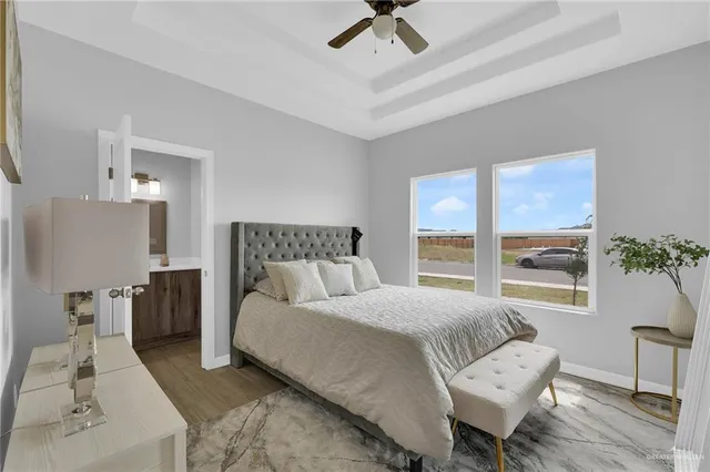 a bedroom with a bed and a couch