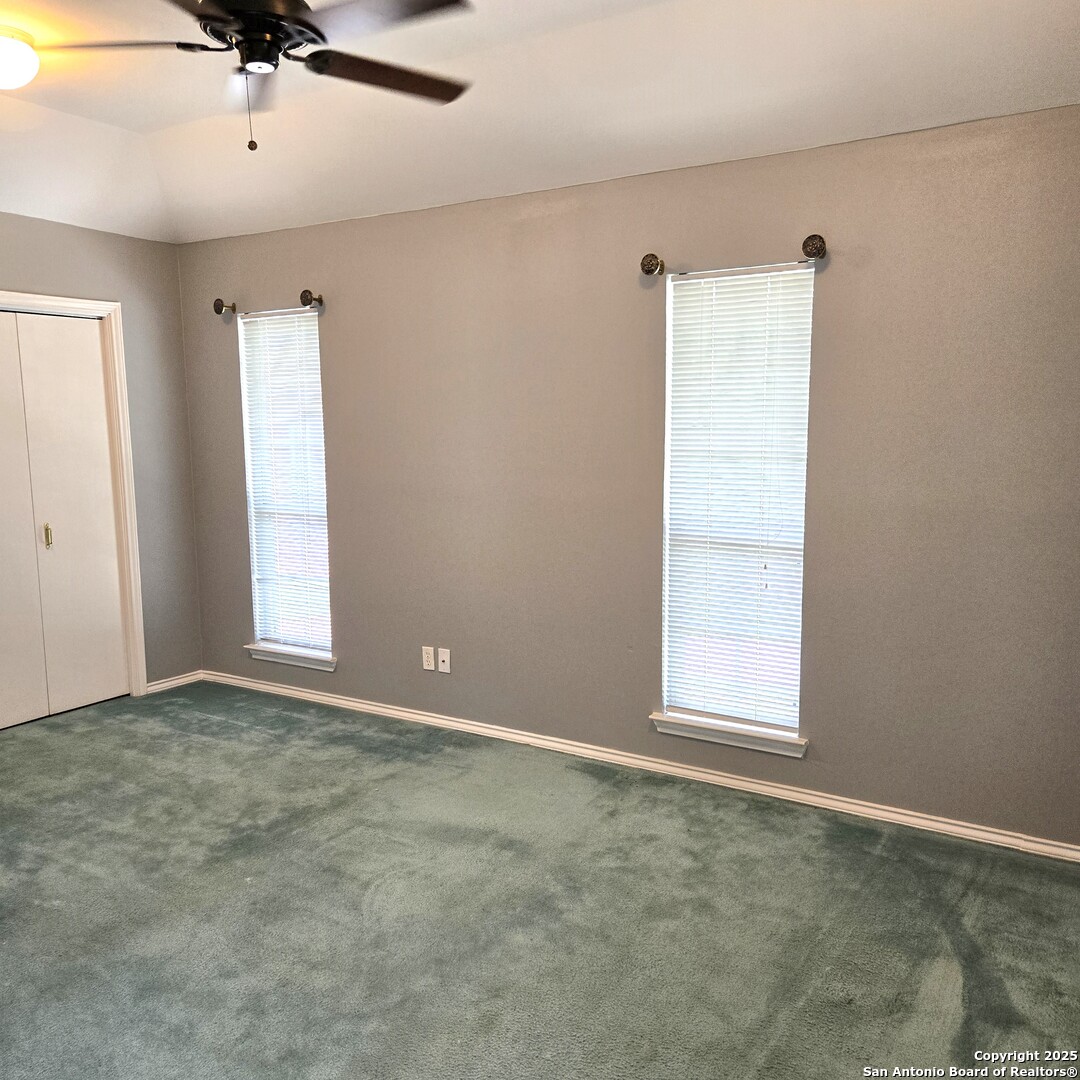 23007 South Breeze Street San Antonio, TX 78258 - Photo 19 of 27 an empty room with a window