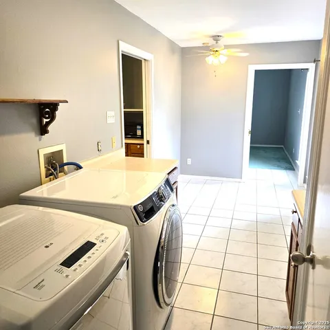 a bedroom with a bed and a mirror