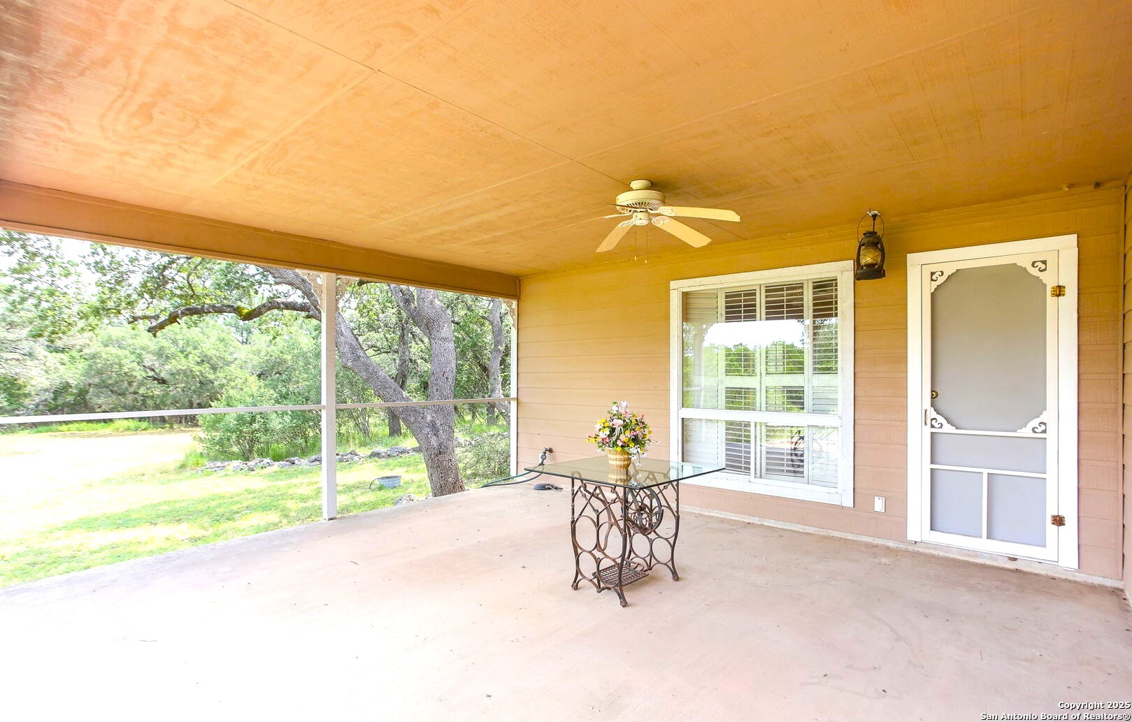 23007 South Breeze Street San Antonio, TX 78258 - Photo 24 of 27 a dining room with furniture and a large window
