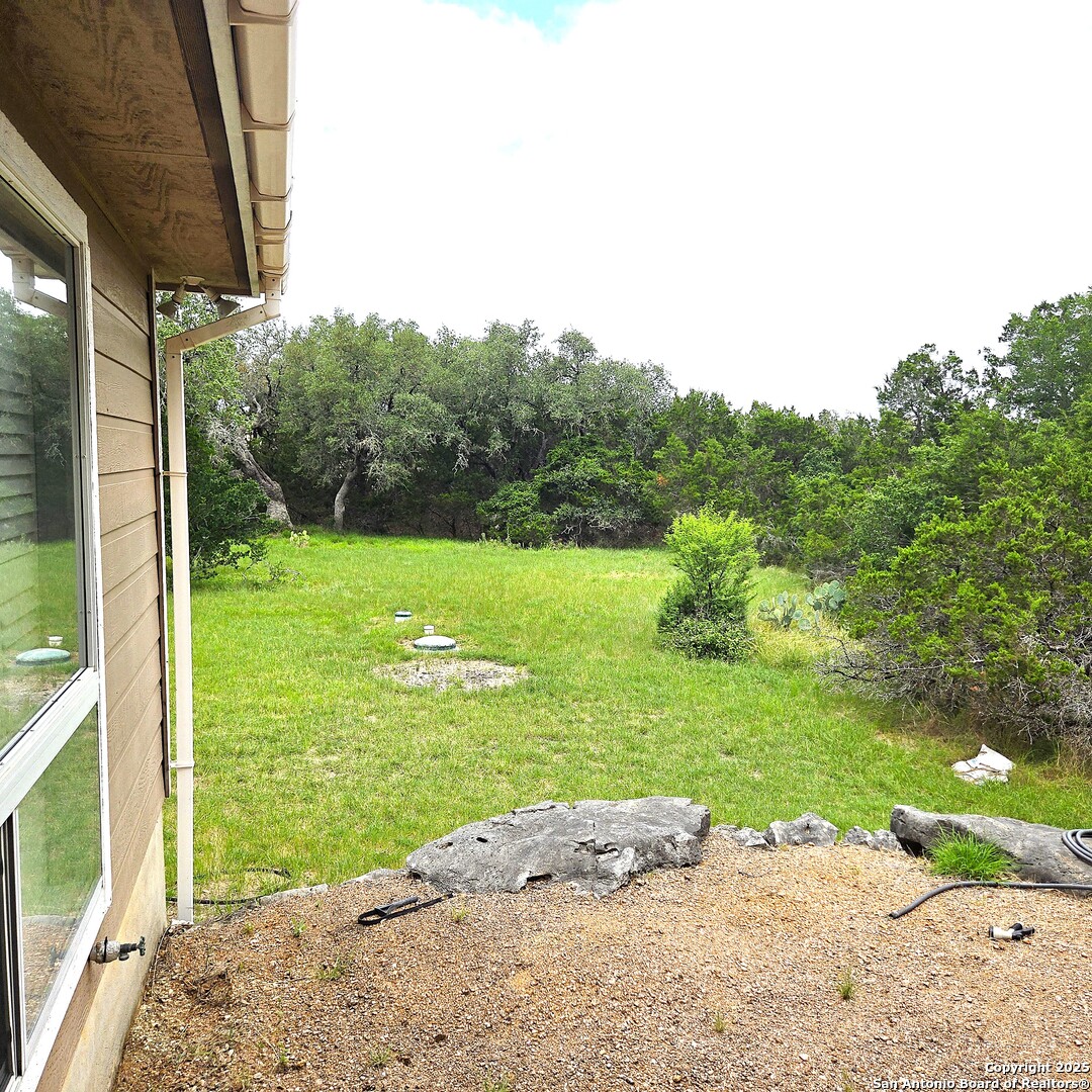 23007 South Breeze Street San Antonio, TX 78258 - Photo 27 of 27 a view of a yard with an outdoor space