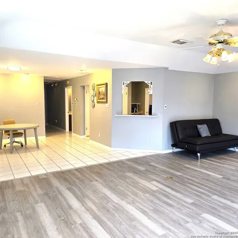 a bedroom with a bed and a cabinets