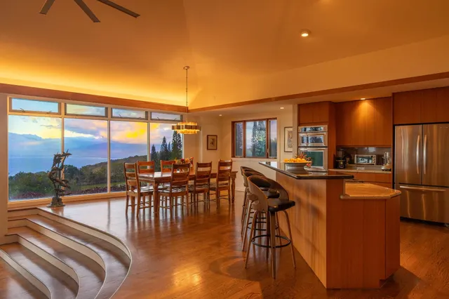 a view of a kitchen with swimming pool and furniture