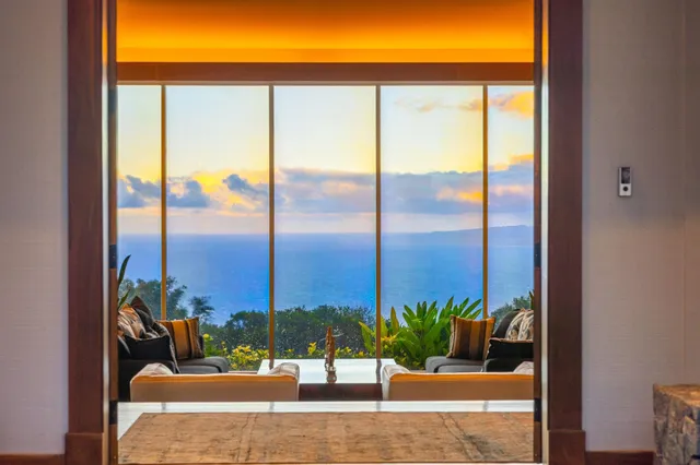 a view of a house with backyard and porch