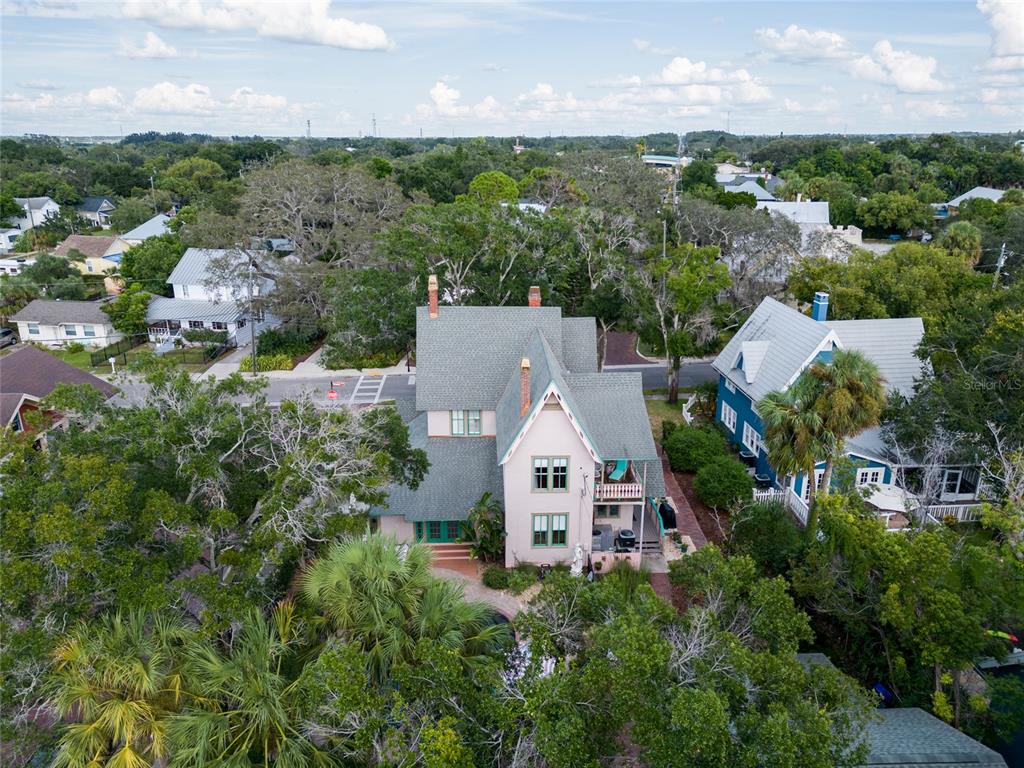 101 Read Street Tarpon Springs, FL 34689 - Photo 80 of 90 an aerial view of a house with a yard and lake view