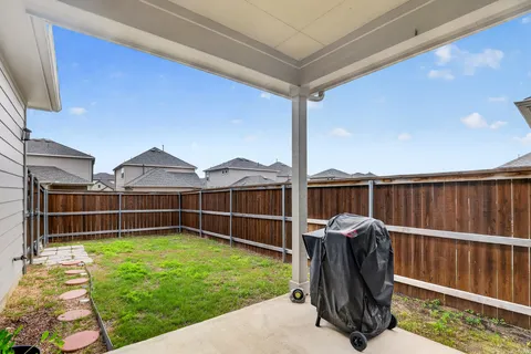 a view of outdoor space with deck and furniture
