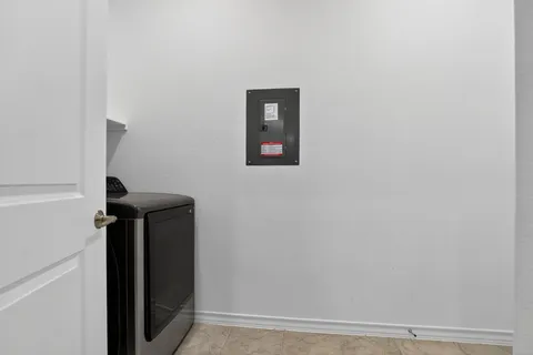 a view of hallway with furniture