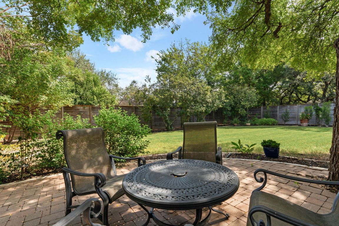 15202 Sun-Bird Lane Austin, TX 78734 - Photo 21 of 28 a view of a table and chairs in patio
