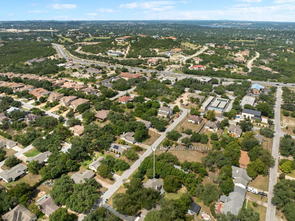 15202 Sun-Bird Lane Austin, TX 78734 - Photo 24 of 28 an aerial view of residential houses with outdoor space