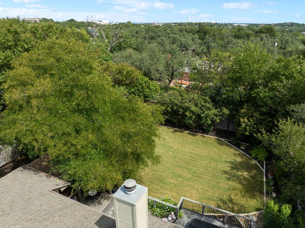 15202 Sun-Bird Lane Austin, TX 78734 - Photo 25 of 28 a view of a yard with an outdoor seating