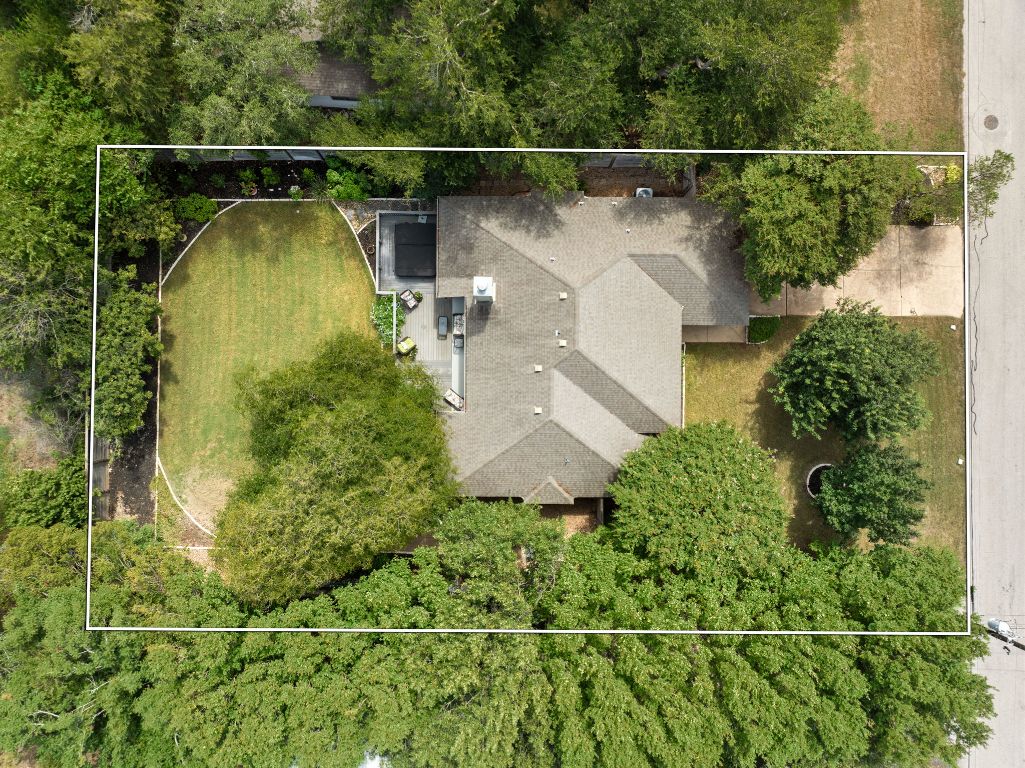 15202 Sun-Bird Lane Austin, TX 78734 - Photo 26 of 28 a view of a swimming pool with a window