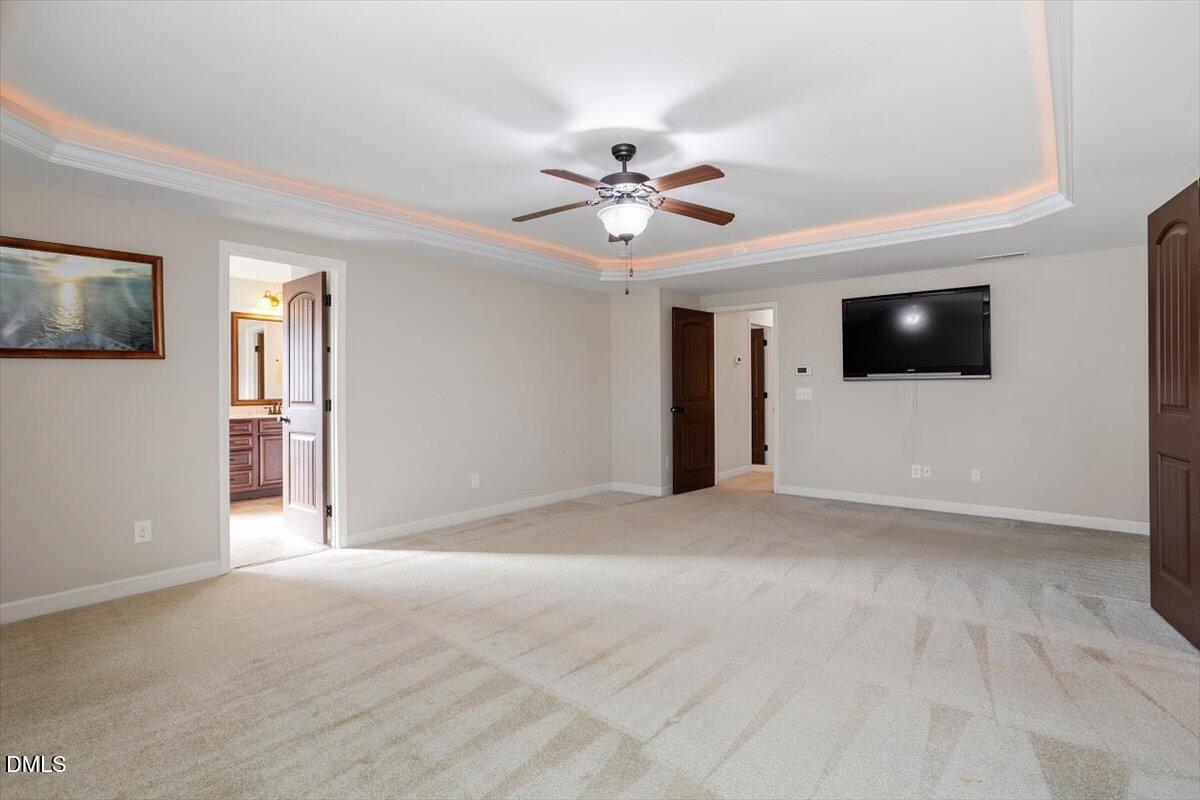 109 North Sunset Ridge Drive Willow Spring, NC 27592 - Photo 22 of 54 a view of a livingroom with a flat screen tv
