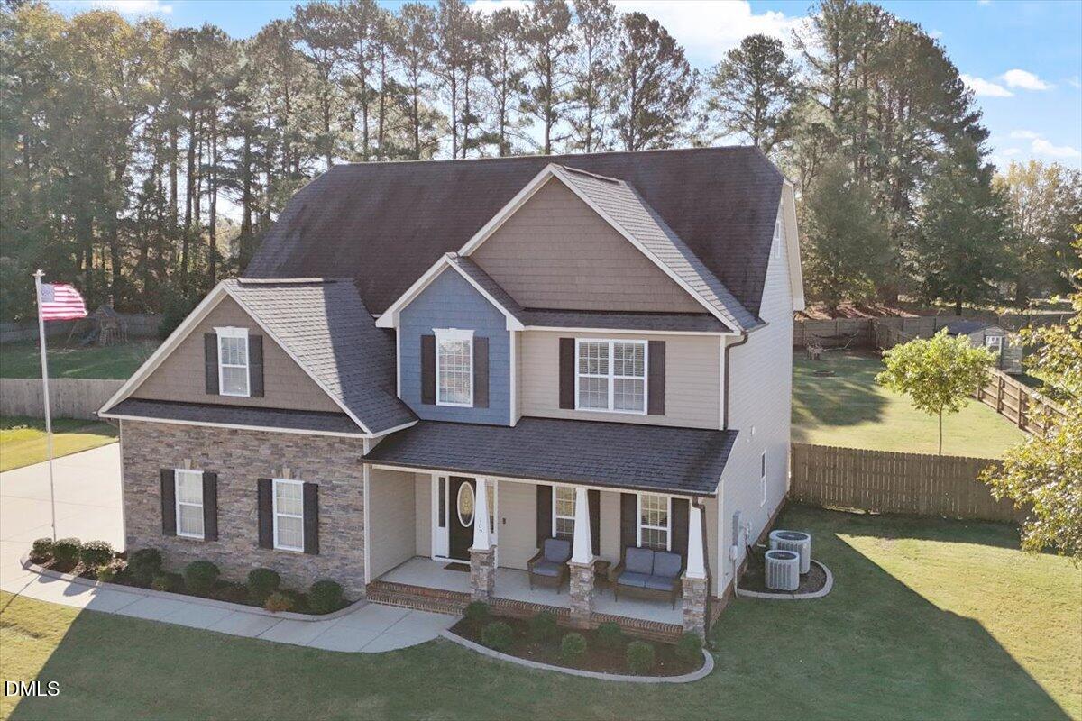 109 North Sunset Ridge Drive Willow Spring, NC 27592 - Photo 38 of 54 a front view of house with yard