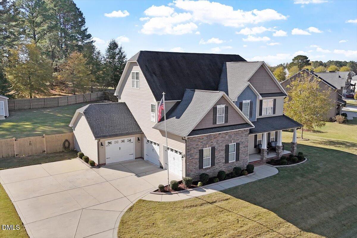 109 North Sunset Ridge Drive Willow Spring, NC 27592 - Photo 39 of 54 a front view of a house with a yard