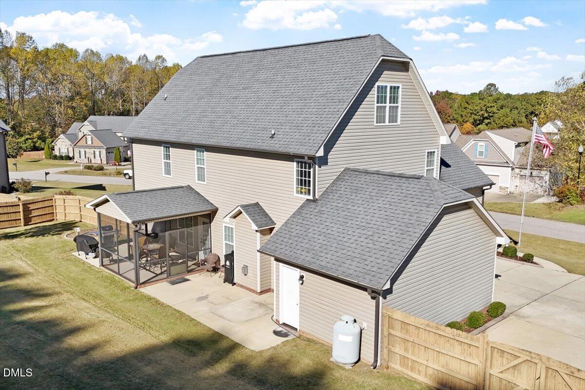 109 North Sunset Ridge Drive Willow Spring, NC 27592 - Photo 45 of 54 a aerial view of a house with a patio