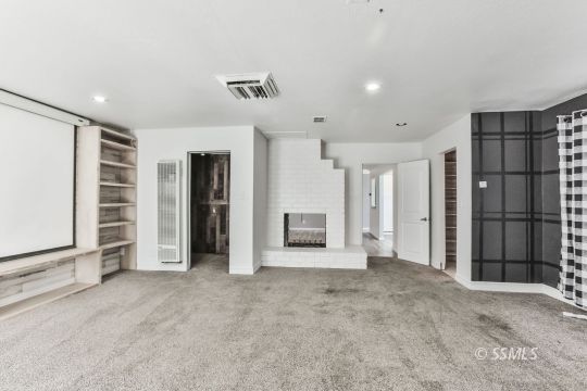 1415 Mayo Street Ridgecrest, CA 93555 - Photo 13 of 34 an empty room with closet and windows